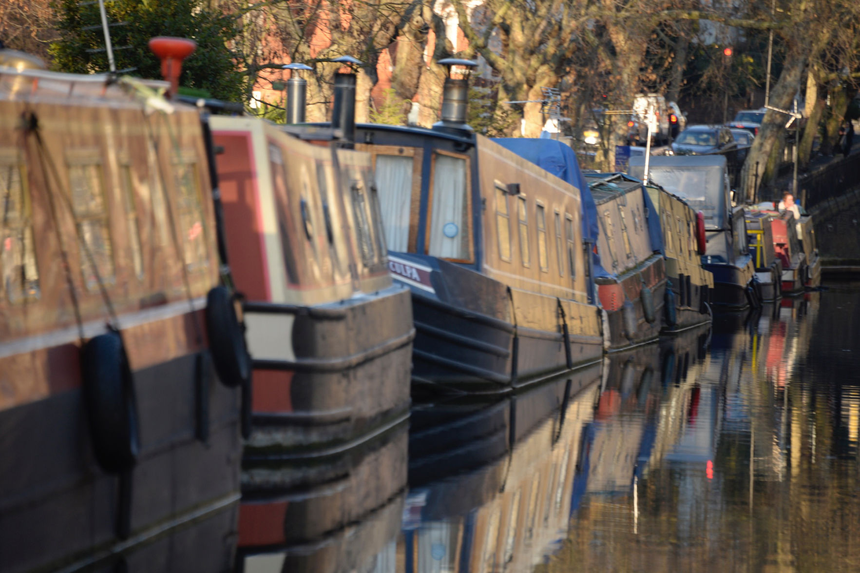 Houseboats along Regent's Canal in London. Round-trip cruises by the London Waterbus Company last about an hour.
